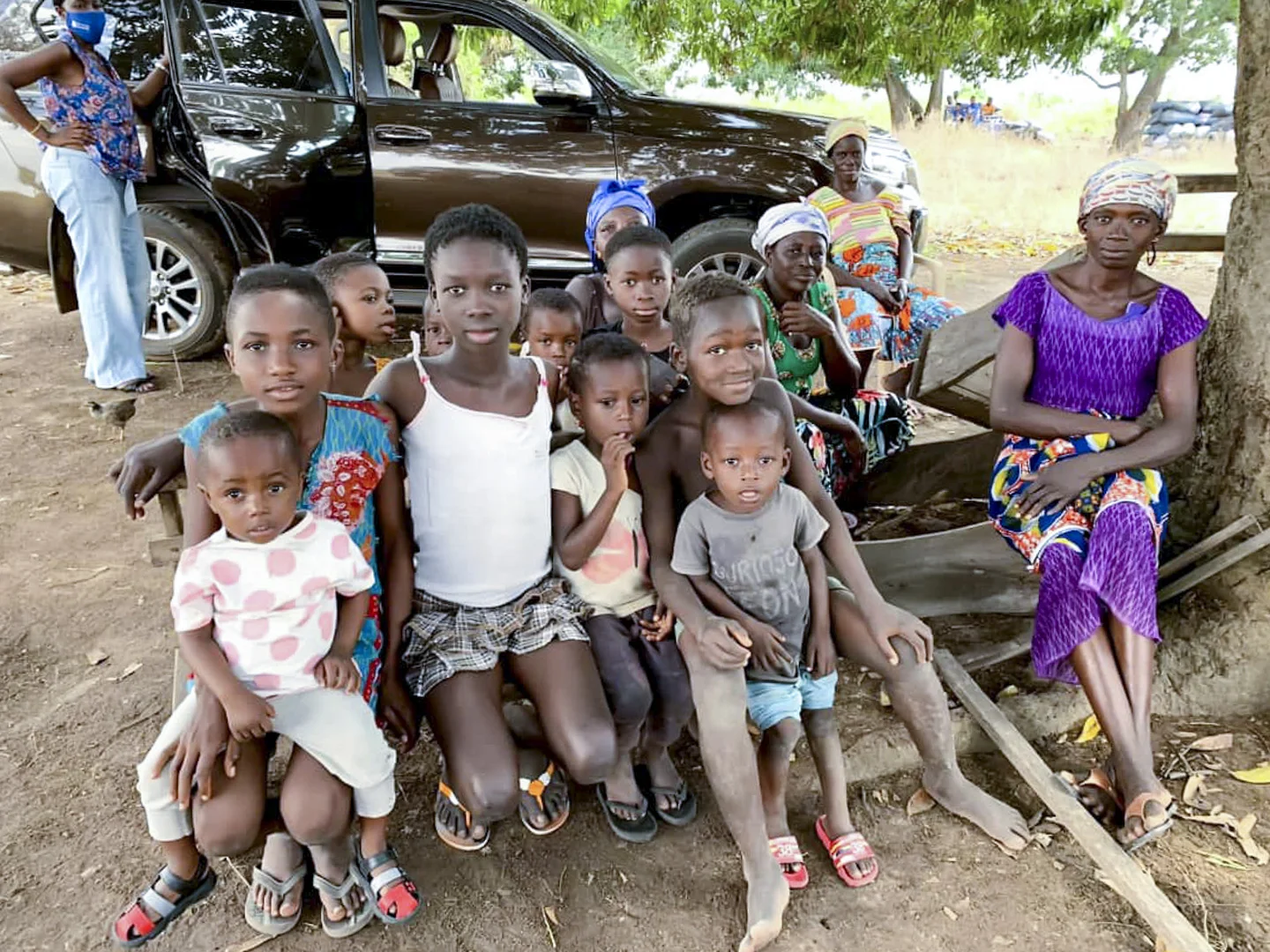 Children and families near the classroom project