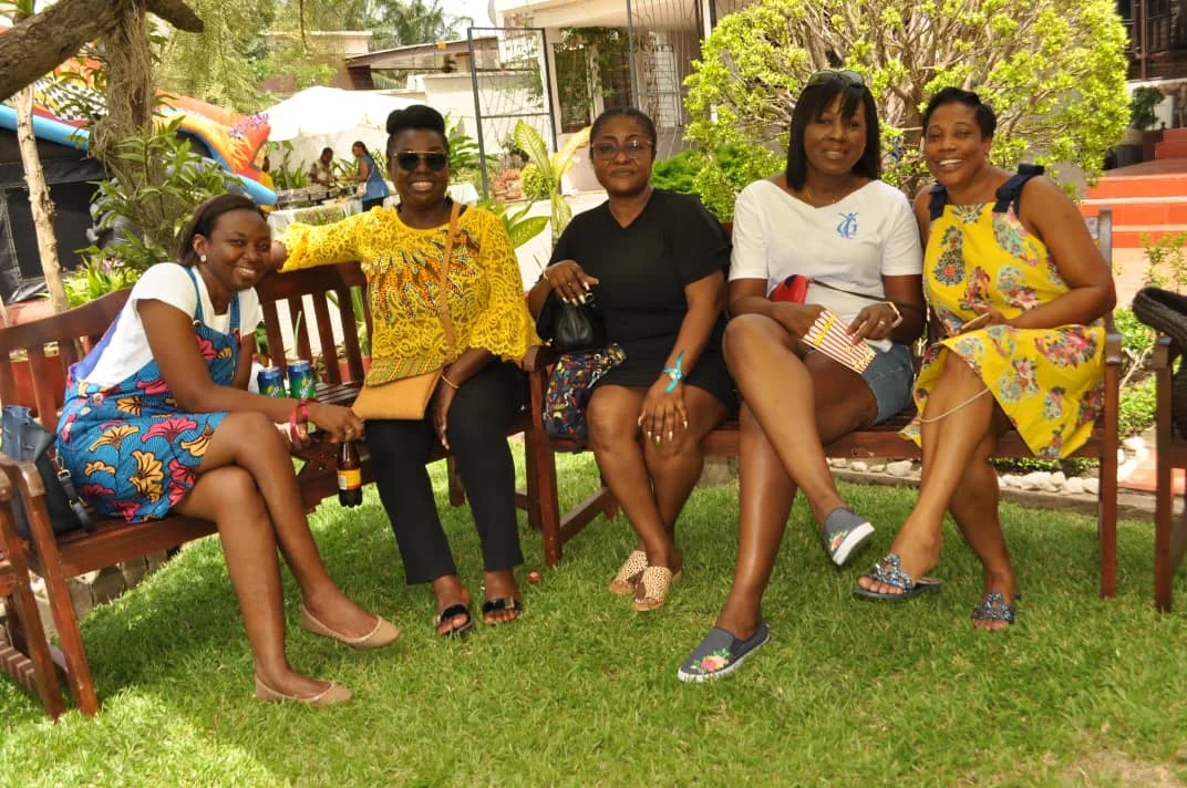 Guests relaxing together in the garden