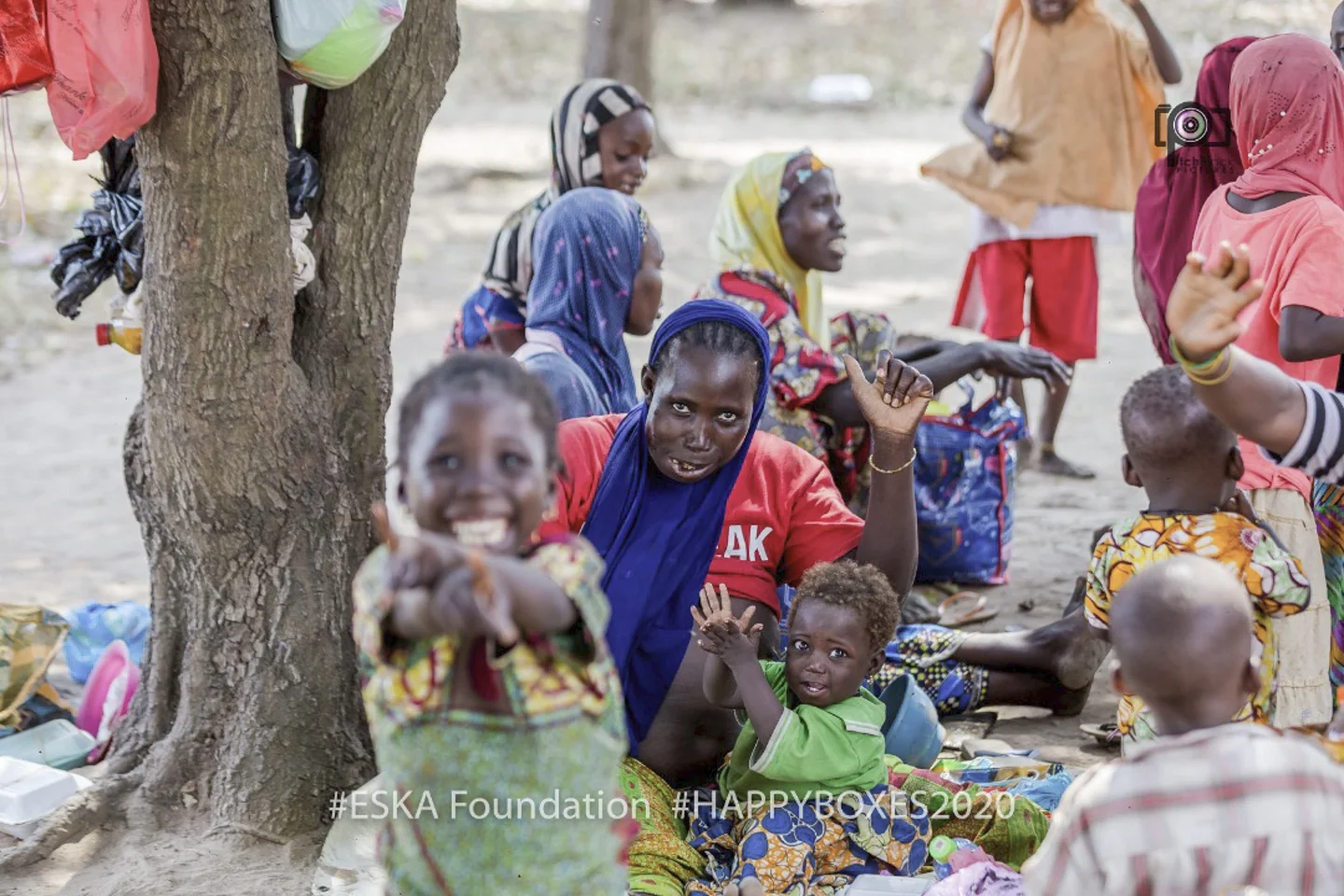 Children gathered near the Happy Boxes outreach