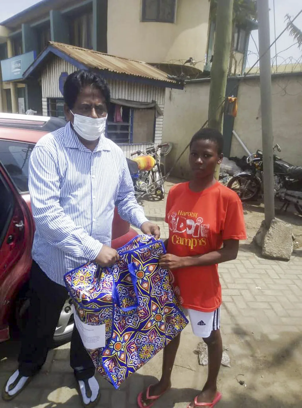 A care package being handed to a young person