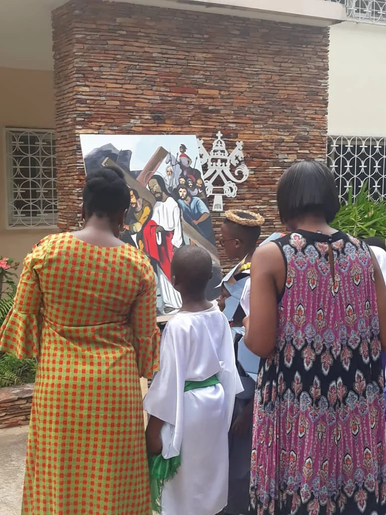 Young people leading a station in prayer