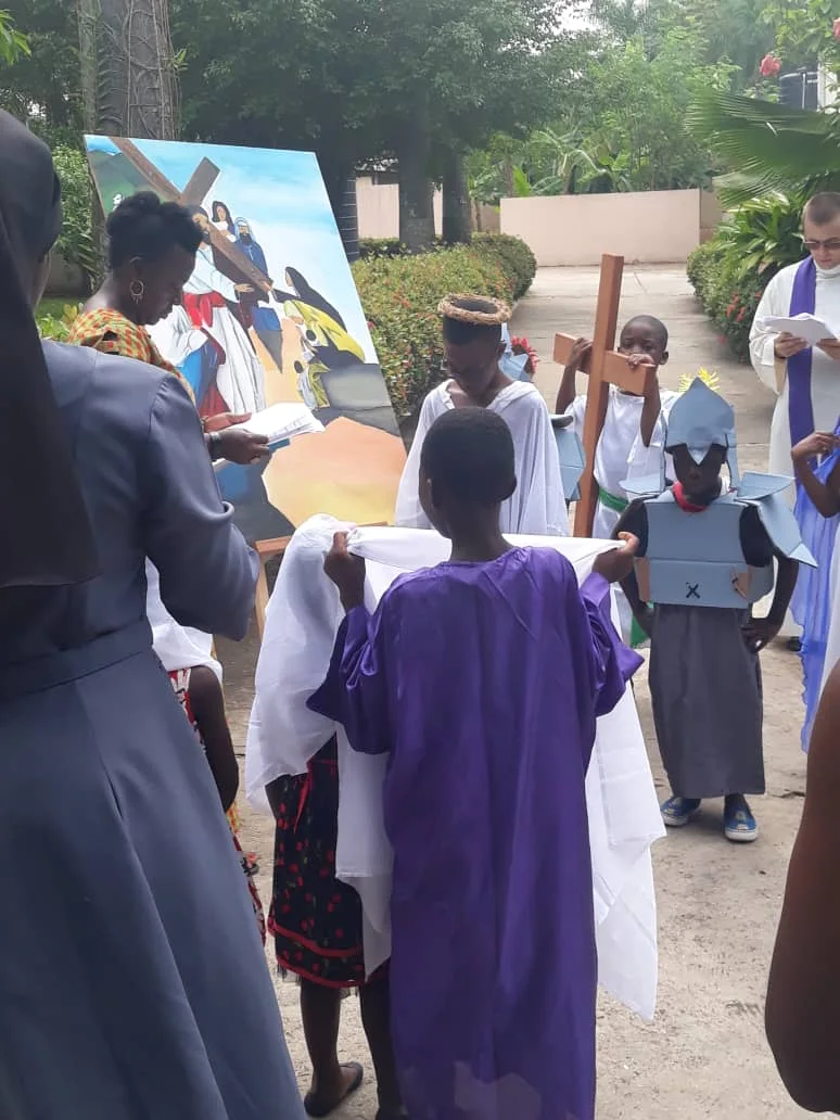A reading during the Stations of the Cross