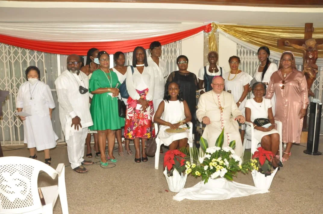 MGCWC members gathered with church leaders after a community celebration